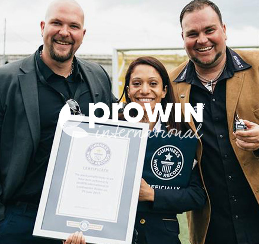 prowin logo on top of an image of two men next to an adjudicator holding a gwr certificate
